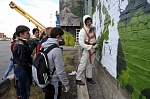 Профессиональные художники-граффитисты раскрасили фасады производственных зданий в Норильске Профессиональные художники-граффитисты раскрасили фасады производственных зданий в Норильске